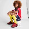 Botas de fútbol para terreno firme y artificial PUMA x CHRISTIAN PULISIC TACTO II para niños Botas de fútbol para terreno firme y artificial PUMA x CHRISTIAN PULISIC TACTO II para niños