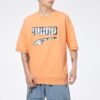 Camiseta Logo Essentials “Naranja y Blanco”