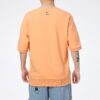 Camiseta Logo Essentials “Naranja y Blanco”