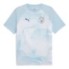 Camiseta prepartido del Manchester City “Azul cielo plateado”