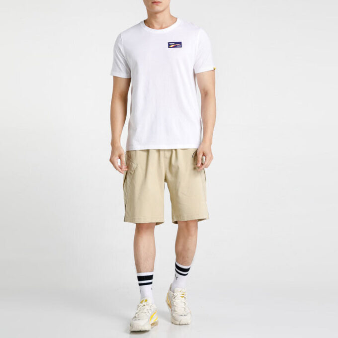 Camiseta PUMA x Randomevent “Blanca, negra y amarilla”
