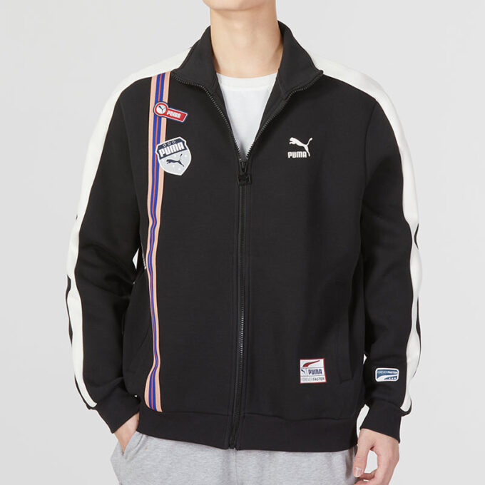 Chaqueta negra con cremallera y escudo del equipo