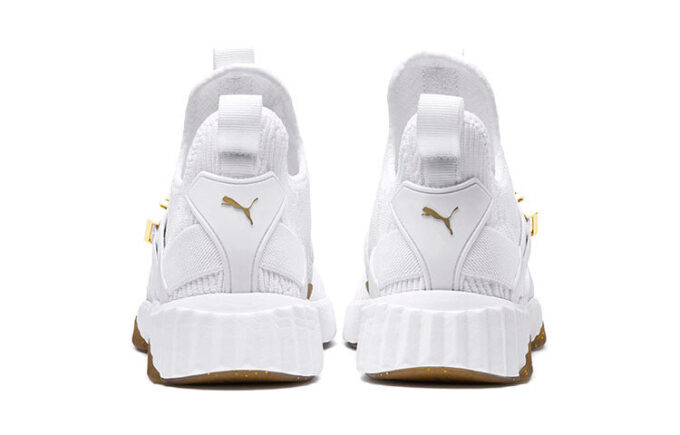 (Mujeres) Defy Varsity Mid “Blanco Dorado Metálico”