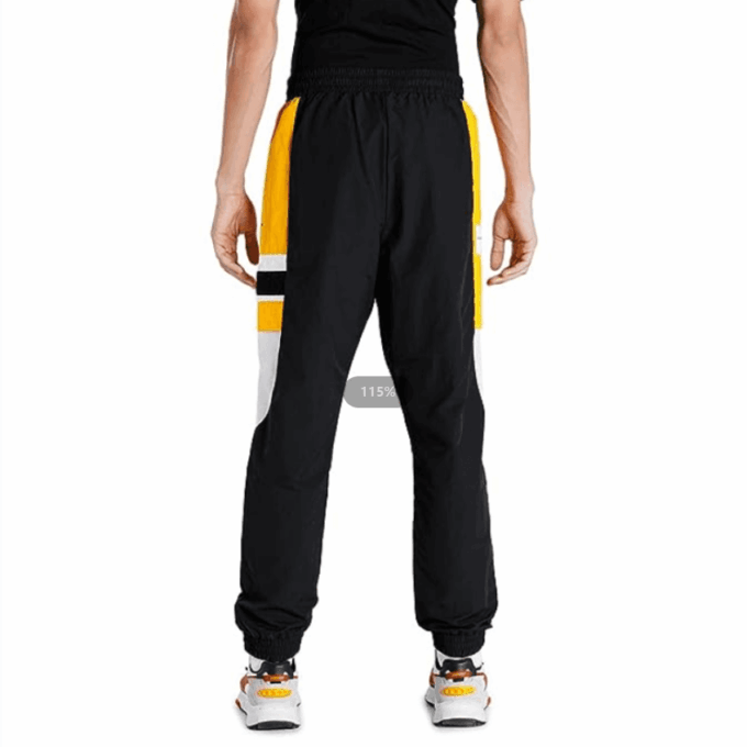 Pantalón deportivo Race Statement de PUMA x Ferrari para hombre, color amarillo