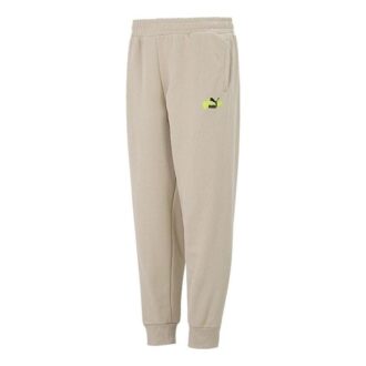 Pantalones con logotipo gráfico de tendencia en beige