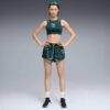 Pantalones cortos de entrenamiento tejidos Green Terrains para mujer Pantalones cortos de entrenamiento tejidos Green Terrains para mujer