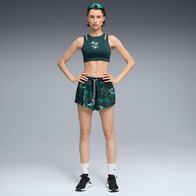 Pantalones cortos de entrenamiento tejidos Green Terrains para mujer Pantalones cortos de entrenamiento tejidos Green Terrains para mujer