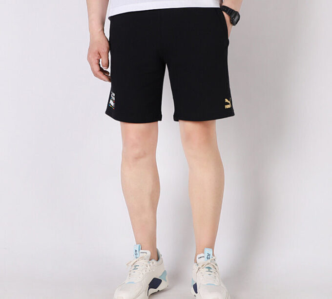 Pantalones cortos Worldhood de Tailored For Sport “Negro, Blanco y Naranja”