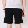 Pantalones cortos Worldhood de Tailored For Sport “Negro, Blanco y Naranja”