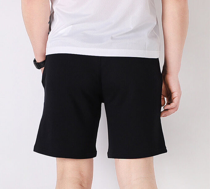 Pantalones cortos Worldhood de Tailored For Sport “Negro, Blanco y Naranja”