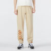 Pantalones de punto con etiqueta CC “Beige”