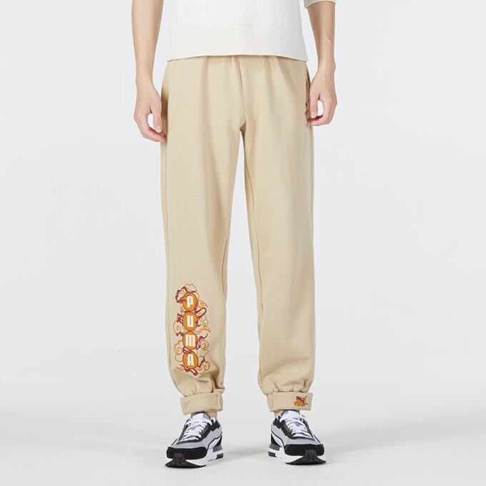 Pantalones de punto con etiqueta CC “Beige”