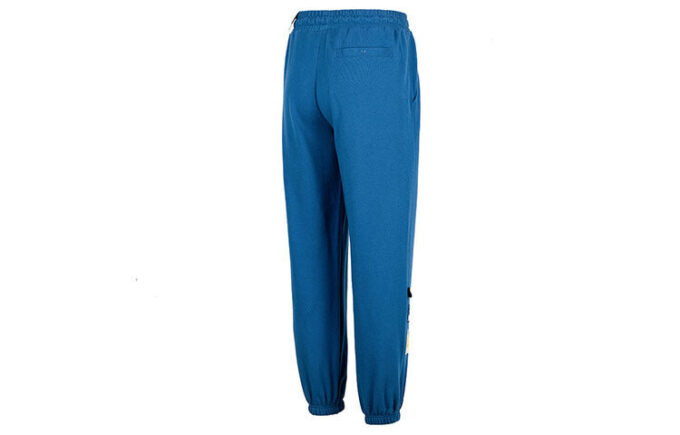 Pantalones deportivos con el logo del equipo en azul