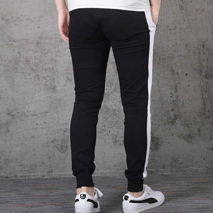 Pantalones deportivos icónicos T7 “Negro y blanco”