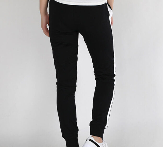 Pantalones deportivos icónicos T7 para mujer, color negro