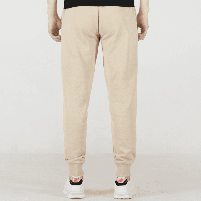 Pantalones deportivos Logo International “Beige”