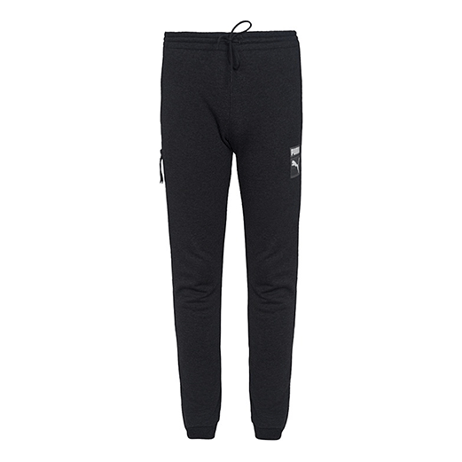 Pantalones deportivos negros con logotipo gráfico de archivo
