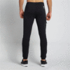 Pantalones deportivos negros con logotipo gráfico de archivo