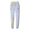 Pantalones deportivos PUMA x KIDSUPER Studios “Morado, amarillo y negro”