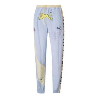 Pantalones deportivos PUMA x KIDSUPER Studios “Morado, amarillo y negro”