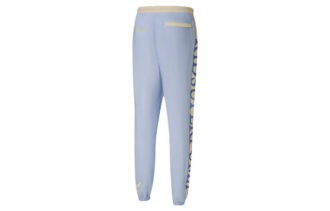 Pantalones deportivos PUMA x KIDSUPER Studios “Morado, amarillo y negro”