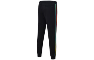 Pantalones deportivos Unity de Tailored For Sport “Negro Naranja”