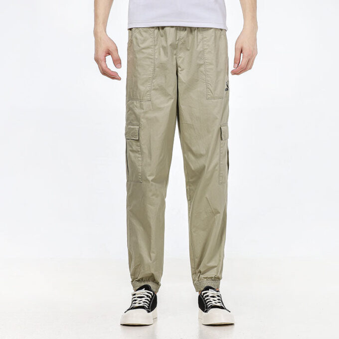 Pantalones largos casuales de tejido cargo con pies tejidos en blanco cremoso