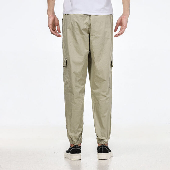 Pantalones largos casuales de tejido cargo con pies tejidos en blanco cremoso
