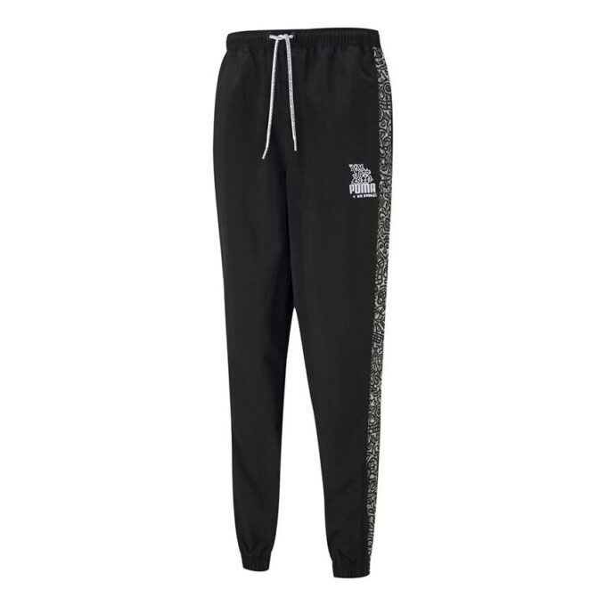 Pantalones largos deportivos con cordón tejido y grafiti Crossover de PUMA x Mr Doodle, color negro
