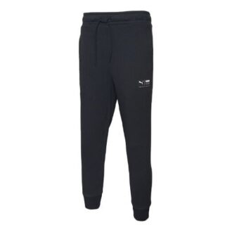 Pantalones negros con el logo del centro
