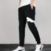 Pantalones negros con logo grande