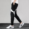 Pantalones negros con logo grande