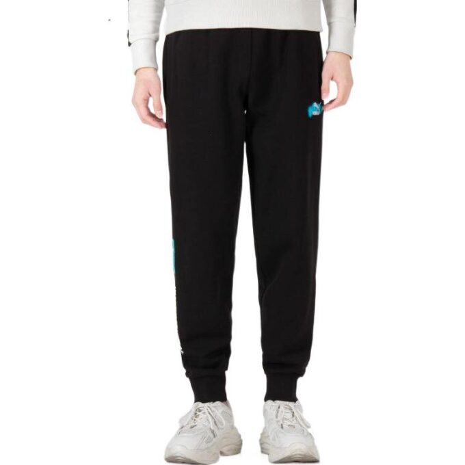 Pantalones negros con logo gráfico de tendencia
