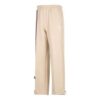 Pantalones rectos con insignia del equipo en beige