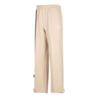 Pantalones rectos con insignia del equipo en beige