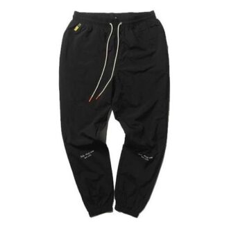 Pantalones tejidos PUMA x Randomevent “Negro”