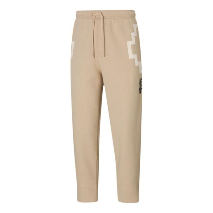 Pantalones unisex PUMA x PRONOUNCE 7/8 con estampado de encaje y corte capri en color caqui