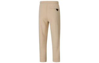 Pantalones unisex PUMA x PRONOUNCE 7/8 con estampado de encaje y corte capri en color caqui