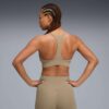 Sujetador deportivo PUMA x ALEX TOUSSAINT Shapeluxe para mujer, transpirable y de impacto medio