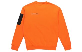 Suéter informal holgado de cuello redondo color naranja llama