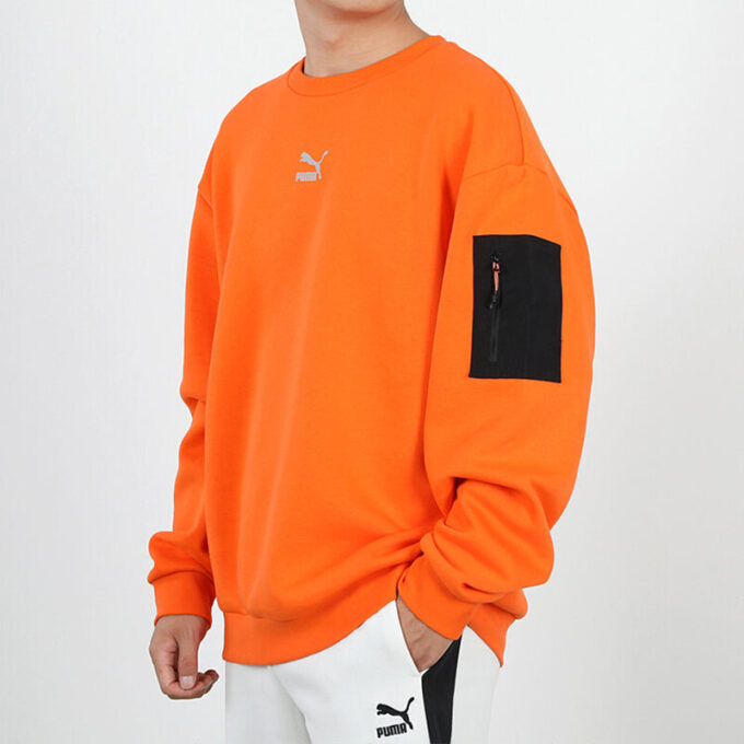 Suéter informal holgado de cuello redondo color naranja llama