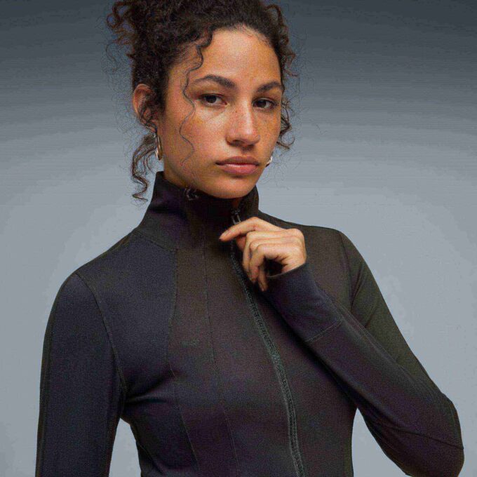 Top deportivo con cremallera para mujer PUMA x GUIZIO Top deportivo con cremallera para mujer PUMA x GUIZIO