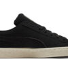 Zapatillas clásicas unisex de ante negro de caña baja