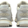 Zapatillas de running Wild Rider de caña baja en color marfil, gris, plateado y blanco