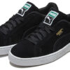Zapatos casuales bajos de gamuza negros y dorados