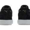 Zapatos casuales bajos de gamuza negros y dorados