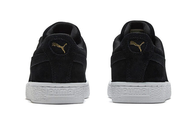 Zapatos casuales bajos de gamuza negros y dorados